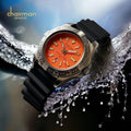black strap watch with orange dial